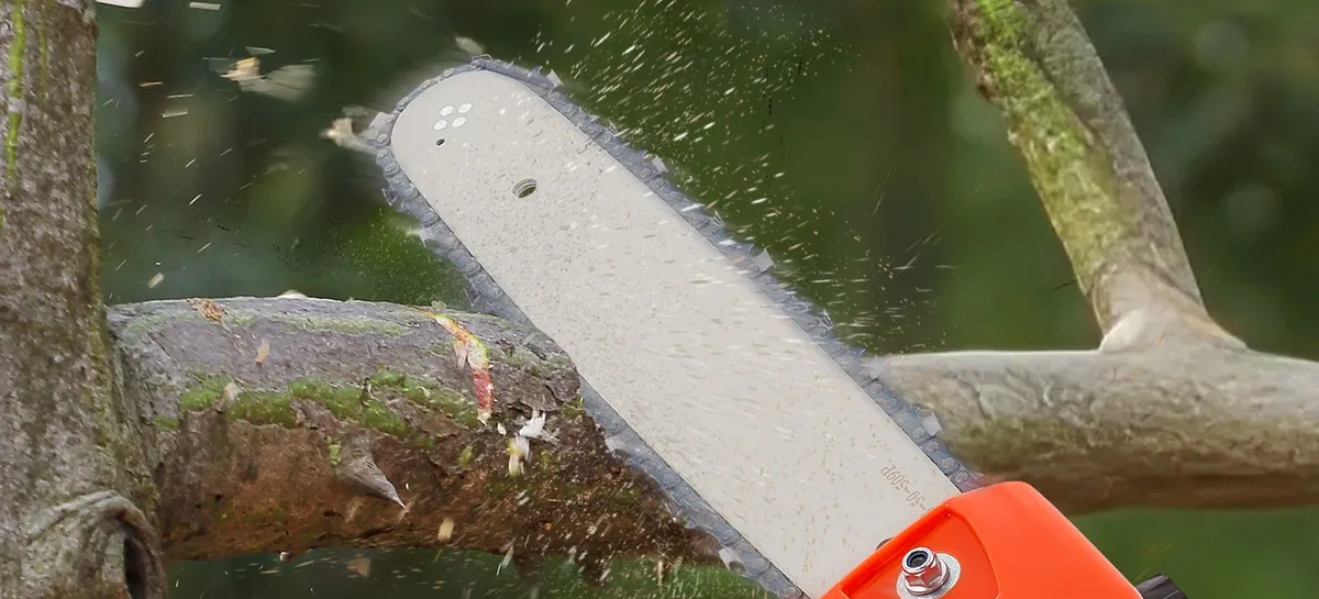 Reaching high branches with the pruning-saw head and telescoping pole